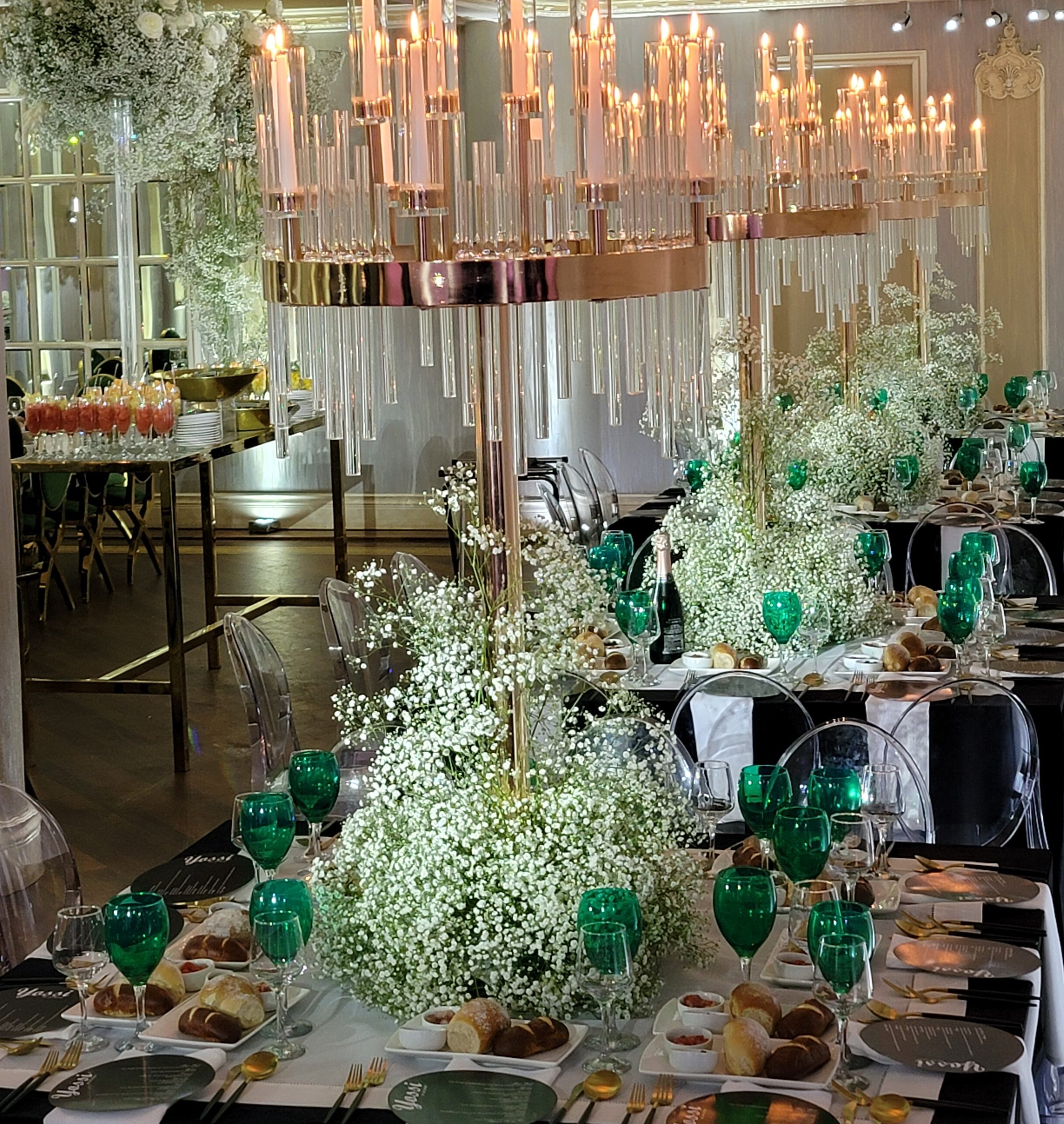 The candle chandeliers and the long tables, the full picture