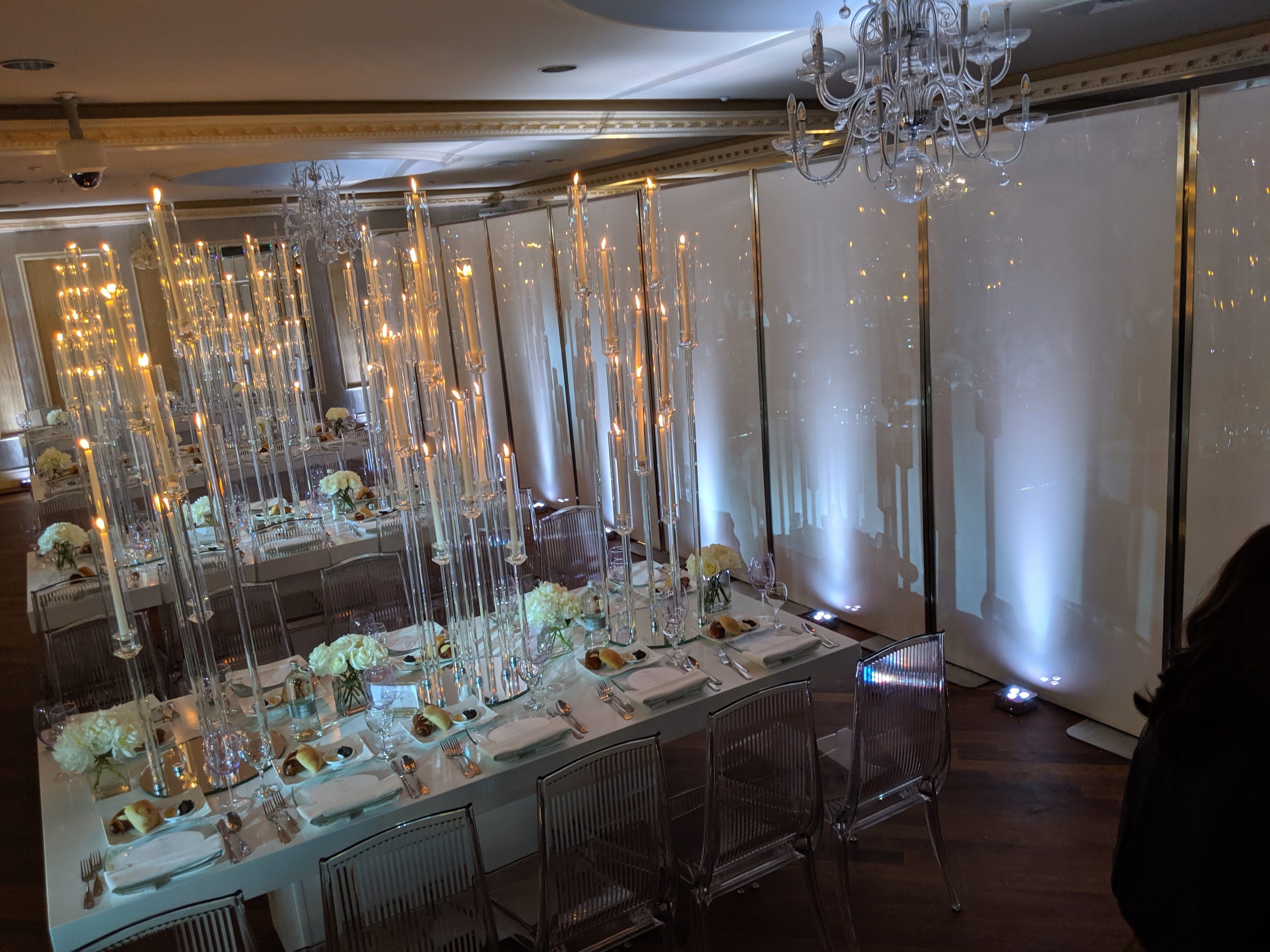 The curtain of light at the end of the room, tapers in front of it